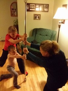 Geoff Kayber: Here is a picture of my wife, son, and nephew with the Festivus Pole... What did I marry into???